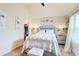 Comfortable bedroom with a queen bed, walk-in closet, and natural light at 312 Sierra Ct, Mcdonough, GA 30253