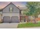 Charming two-story home with a well-manicured lawn, mature landscaping, and a two-car garage at 312 Sierra Ct, Mcdonough, GA 30253