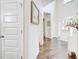 Bright foyer with hardwood floors, high ceilings, and a view of the entryway at 312 Sierra Ct, Mcdonough, GA 30253