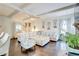 Open living area featuring an overstuffed sectional, hardwood floors and designer touches at 312 Sierra Ct, Mcdonough, GA 30253