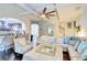 Spacious open concept living room with an arched entryway, and a cozy seating arrangement at 312 Sierra Ct, Mcdonough, GA 30253