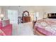 Spacious main bedroom featuring vaulted ceilings and seating area at 312 Sierra Ct, Mcdonough, GA 30253