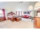 Large main bedroom featuring vaulted ceilings, sitting area, and stylish furniture at 312 Sierra Ct, Mcdonough, GA 30253