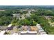 Aerial view of new neighborhood with tree-lined streets, and community amenities at 60 Linton St, Woodstock, GA 30188