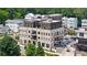 Attractive brick building with outdoor seating, offering a vibrant commercial space at 60 Linton St, Woodstock, GA 30188
