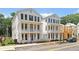 Beautiful white homes featuring double balconies and charming architectural details at 60 Linton St, Woodstock, GA 30188