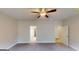 Spacious carpeted bedroom with ceiling fan and dual doors offers comfort and style at 3402 Milan Ct # 1 Plapprox Sqft 2, Douglasville, GA 30135