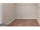 Neutral toned carpeted closet with white trim and metal shelving at 3402 Milan Ct # 1 Plapprox Sqft 2, Douglasville, GA 30135