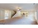Open-concept living room featuring hardwood floors, a staircase, and a view of the modern kitchen at 3402 Milan Ct # 1 Plapprox Sqft 2, Douglasville, GA 30135