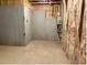 Unfinished basement with concrete walls, exposed framing, and visible utilities at 3402 Milan Ct, Douglasville, GA 30135