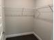 Organized walk-in closet with shelving, offering ample storage space at 3402 Milan Ct, Douglasville, GA 30135