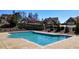 Large community pool with crystal clear water and plenty of space for swimming at 5640 Hammock Way, Cumming, GA 30028