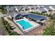 Aerial view of the community pool, featuring ample parking and lounge chairs at 5640 Hammock Way, Cumming, GA 30028
