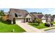 Beautifully landscaped front yard with a well-maintained lawn and inviting curb appeal at 5640 Hammock Way, Cumming, GA 30028