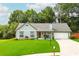 Charming single-story home with a well-maintained front yard and inviting curb appeal at 787 Mckendree Lake Way, Lawrenceville, GA 30043