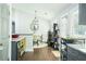 Open kitchen and dining area with granite countertops and modern decor at 787 Mckendree Lake Way, Lawrenceville, GA 30043