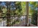 Outdoor balcony view overlooking lush trees and neighborhood at 1836 Preserve Way, Brookhaven, GA 30341