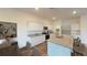 Modern kitchen featuring white cabinets, granite countertops, stainless steel appliances, and island seating at 2308 Argento Cir, Dacula, GA 30019