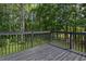View from the back deck showing the mature trees surrounding the property at 397 Lovejoy Cir, Powder Springs, GA 30127