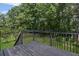 Spacious back deck overlooks well-maintained yard and mature trees at 397 Lovejoy Cir, Powder Springs, GA 30127