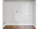 This tidy laundry room has connections for appliances and overhead storage at 397 Lovejoy Cir, Powder Springs, GA 30127