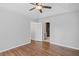 Spacious main bedroom features wood-look floors, tray ceilings, and ensuite access at 397 Lovejoy Cir, Powder Springs, GA 30127