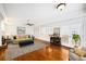 Comfortable living room with hardwood floors, a fireplace, and a neutral color scheme at 5427 Trentham Dr, Atlanta, GA 30338