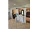 Inviting living room features tile floors, columns, and access to backyard at 616 Burnt Creek Nw Way, Lilburn, GA 30047