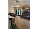 Comfortable living room features a brick fireplace and a ceiling fan at 616 Burnt Creek Nw Way, Lilburn, GA 30047