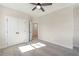 Bright bedroom with open closet at 164 Palm St, Holly Springs, GA 30188