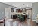 Stylish kitchen with dark cabinetry, a center island, and stainless steel appliances at 4746 Highland Ave, Sugar Hill, GA 30518