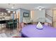 Open-concept living space featuring a modern kitchen, dining area, and comfortable seating at 4746 Highland Ave, Sugar Hill, GA 30518