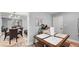 Cozy dining area with table and seating flowing into the main living area at 5599 Redan Cir, Stone Mountain, GA 30088