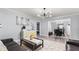 Open living area with stylish furniture, wood-look floors, and easy access to the dining area at 5599 Redan Cir, Stone Mountain, GA 30088