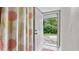 Mud Room with back door leading to lush green yard and space to unwind at 5599 Redan Cir, Stone Mountain, GA 30088