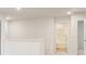 Open hallway showcases a bathroom with a tub and shower combination inside the home at 7254 Deering Court Lot 177, Douglasville, GA 30134