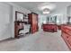 Bedroom with wooden furniture, including a desk and dresser, offering ample storage and style at 1076 Pinyan Ln, Canton, GA 30115