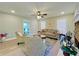 Spacious living room with hardwood floors, fireplace, neutral paint, and plenty of natural light at 430 Thornbush Trce, Lawrenceville, GA 30046