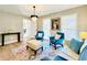 Comfortable living area featuring hardwood floors, recessed lighting, and stylish, modern furnishings at 430 Thornbush Trce, Lawrenceville, GA 30046