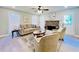 Comfortable living room featuring hardwood floors, a fireplace, and a neutral color palette at 430 Thornbush Trce, Lawrenceville, GA 30046