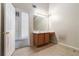 Bathroom featuring a vanity with integrated sink and mirror at 6341 Lake Valley Pt, Lithonia, GA 30058