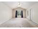 Spacious bedroom with a large window providing natural light at 6341 Lake Valley Pt, Lithonia, GA 30058