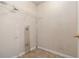 Small closet with a wire shelf above at 6341 Lake Valley Pt, Lithonia, GA 30058