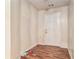 Entryway with wood-look flooring and a white front door at 6341 Lake Valley Pt, Lithonia, GA 30058