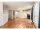 Spacious open-concept living room featuring laminate flooring and fireplace at 6341 Lake Valley Pt, Lithonia, GA 30058