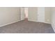 Bedroom featuring neutral walls, carpet, and white doors at 1755 Rutland Pass Dr, Lawrenceville, GA 30045