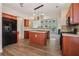 Spacious kitchen with island, stainless steel appliances, and wood cabinets at 1755 Rutland Pass Dr, Lawrenceville, GA 30045