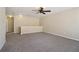 Large living room with neutral walls, carpet, and white trim at 1755 Rutland Pass Dr, Lawrenceville, GA 30045