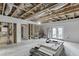 Unfinished basement space with framing and a walk-out to the backyard at 1830 Secretariat Gait Way, Suwanee, GA 30024