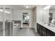 Bathroom leading to the main bedroom with walk-in shower and tub at 1830 Secretariat Gait Way, Suwanee, GA 30024